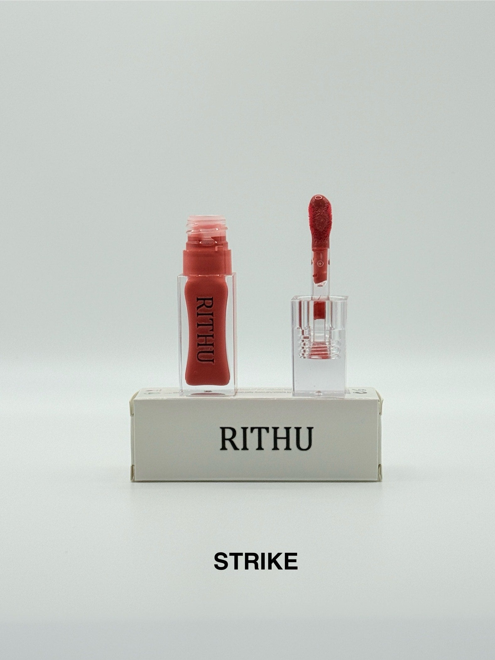 RITHU Lip Gloss Shade: STRIKE